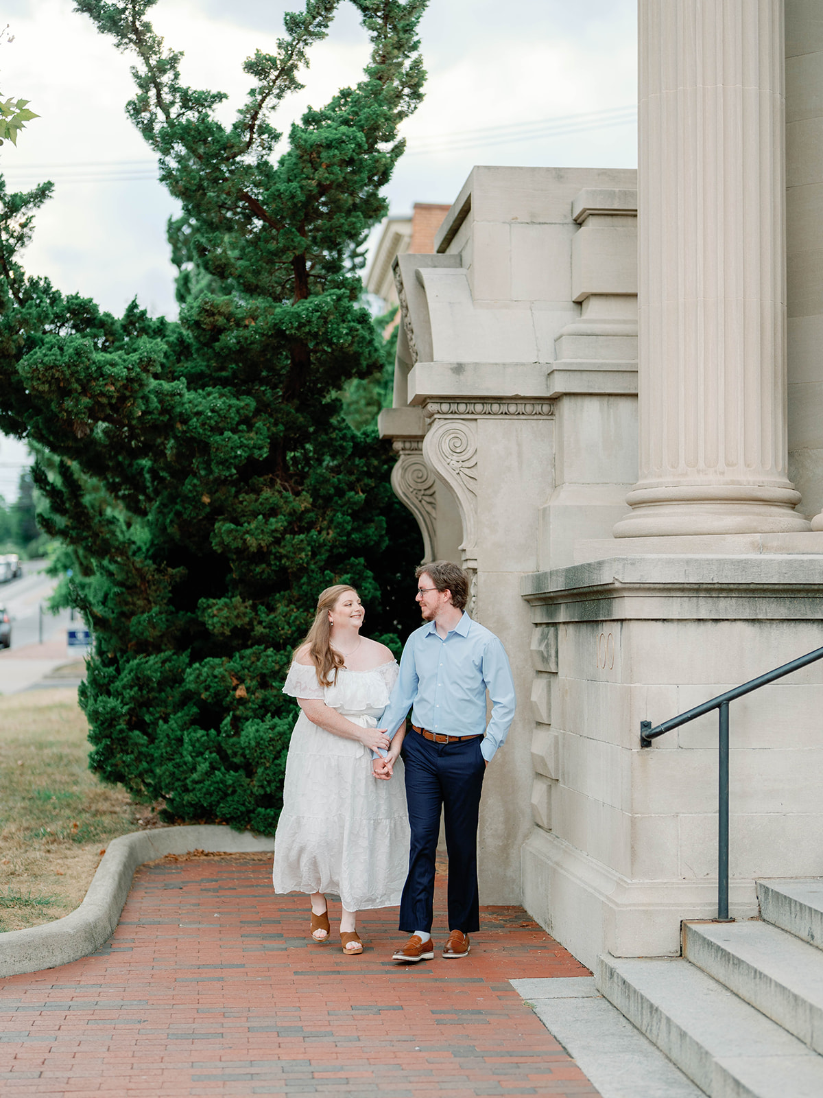 Couple walking side by side at Handley Library